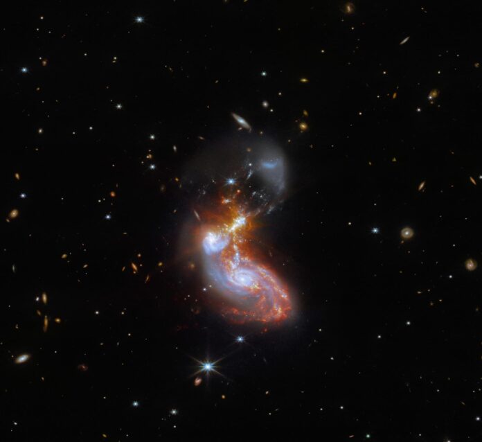 Hang out long enough and you start to become each other…just ask these galaxies. (NASA)