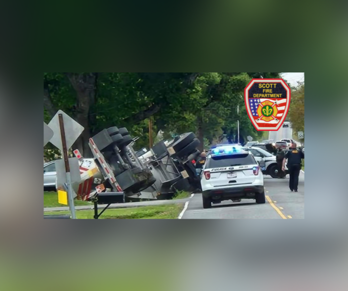 Scott: Semi-truck hauling hazardous chemical overturned (Photo: Scott FD)