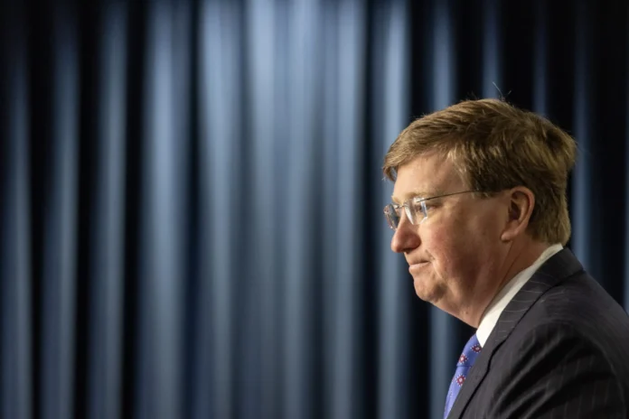 Gov. Tate Reeves prepares to answer questions from the media after signing House Bill 1671, House Bill 510 and Senate Bill 2696 into law at the Walter Sillers Building in Jackson, Miss., Wednesday, April 19, 2023. Credit: Eric Shelton/Mississippi Today