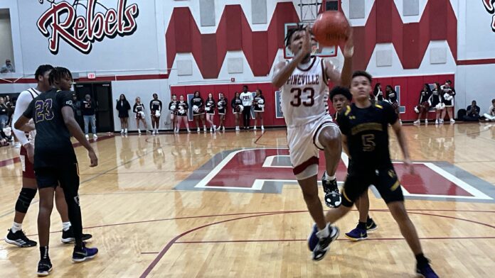 Runnin' Rebels Triumph in Epic Rivalry Clash: Dominate ASH Trojans 66-54