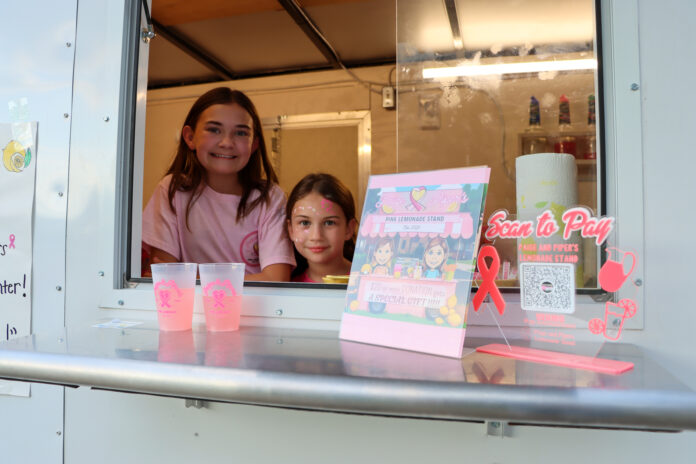 Paige and Piper’s Lemonade Stand Raises $12,000 for Cancer Patients